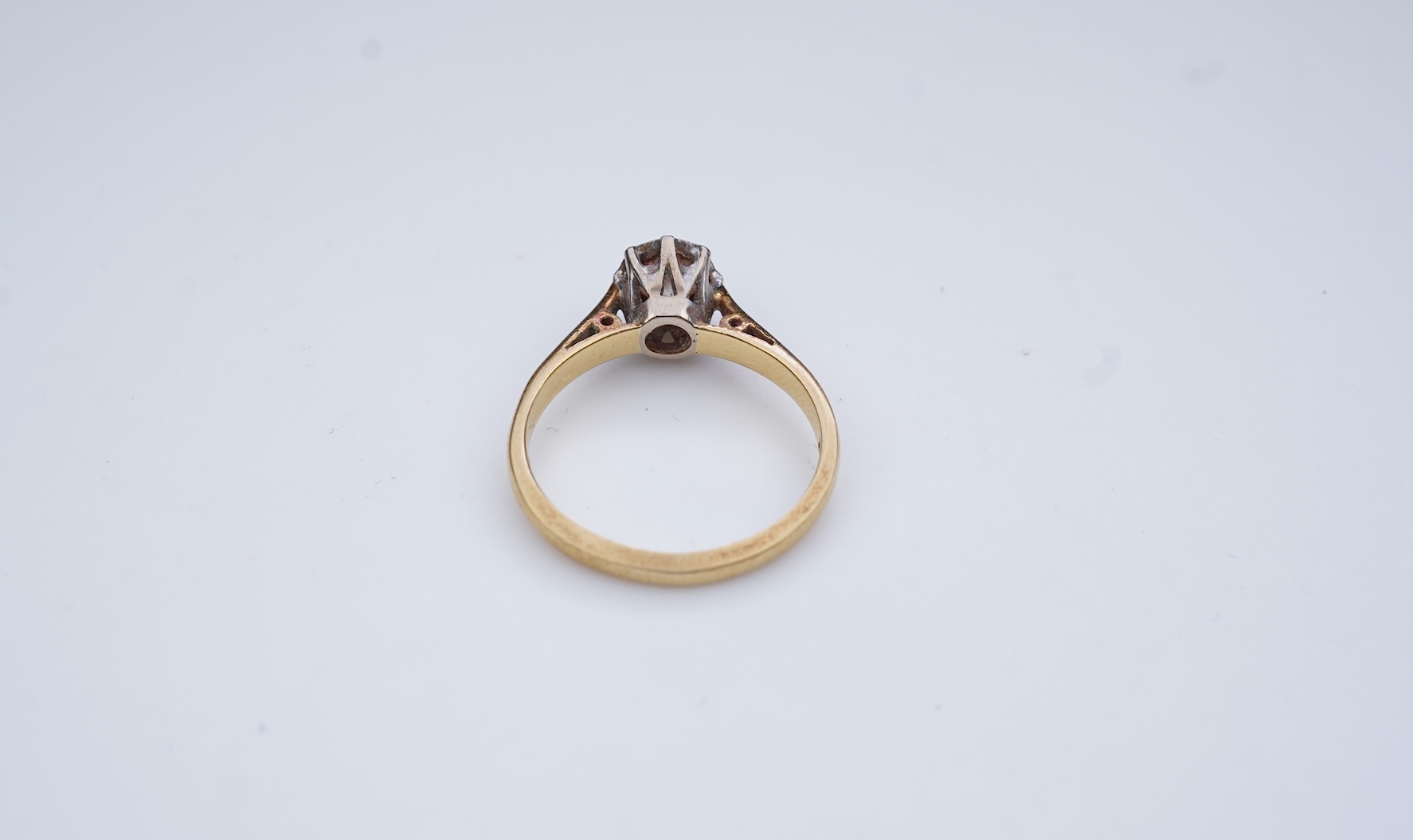 A diamond solitaire ring